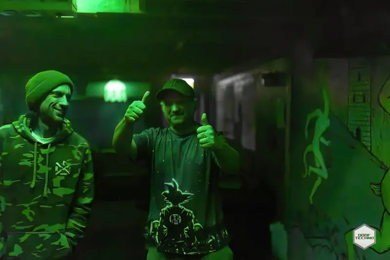 Two mates give the camera a thumbs up. Launch night, May 2025