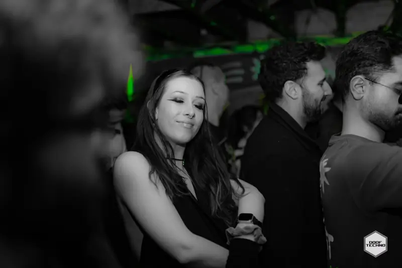 A dancer smiles over her shoulder