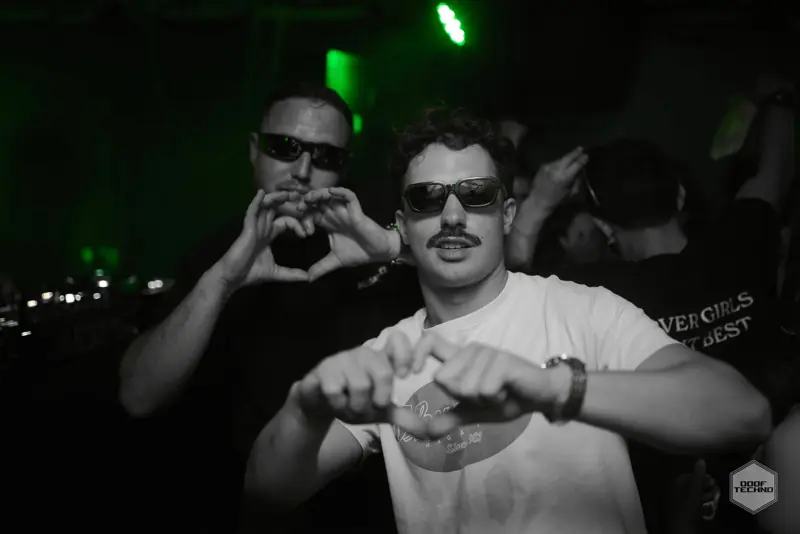 Hands making hearts at the camera