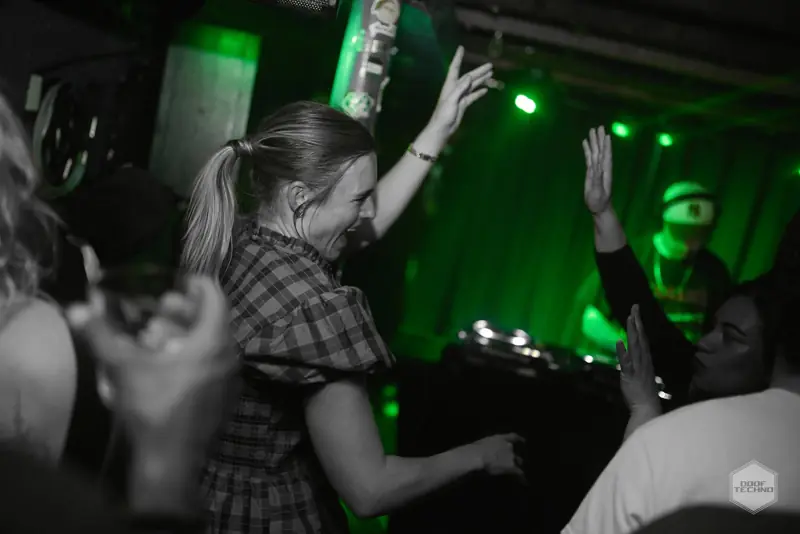 Dancers with their arms in the air