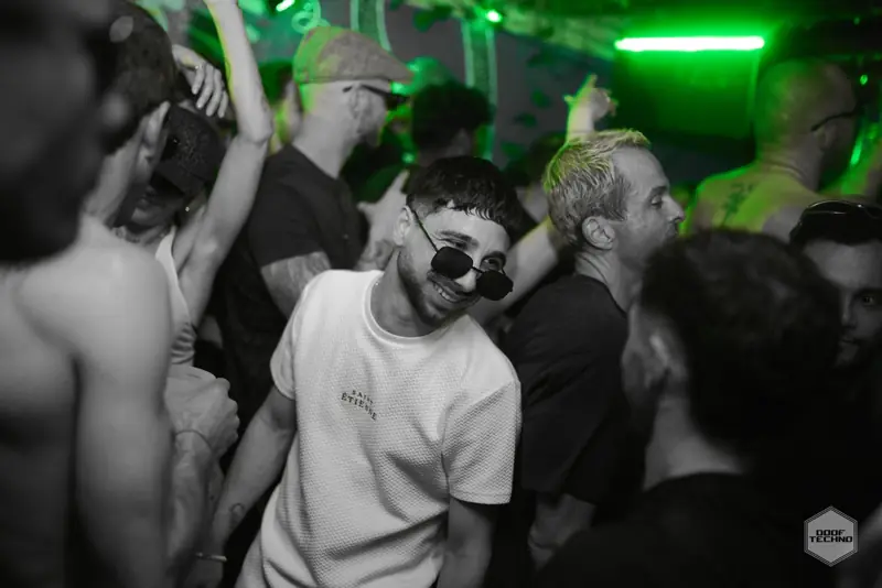 Sunglasses and smiles in a crowded room