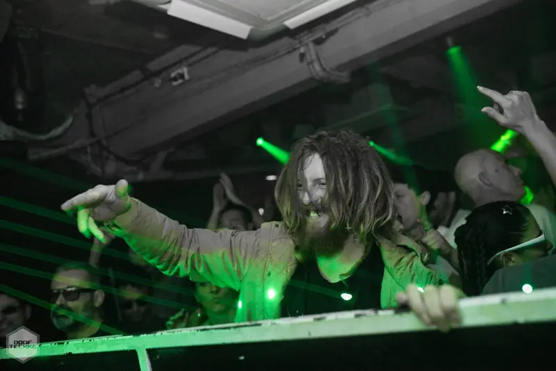 A dancer leans over the barrier, pointing at the decks. Kaufmann at Electric Circus, Oct 2026