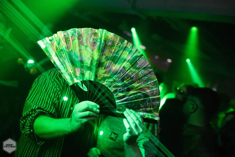 A holographic fan spread wide in the lasers. Kaufmann at Electric Circus, Oct 2026