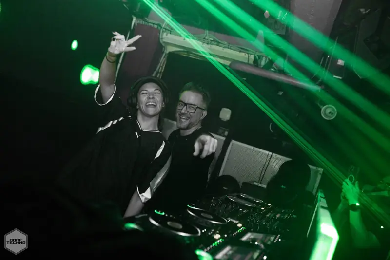 A DJ grins at the crowd from behind the decks. Kaufmann at Electric Circus, Oct 2026