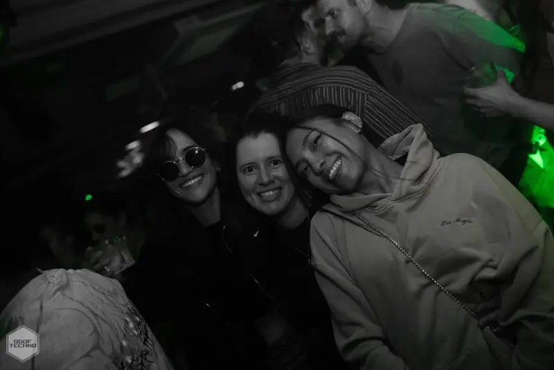 Three friends squeeze together for the camera. Kaufmann at Electric Circus, Oct 2026